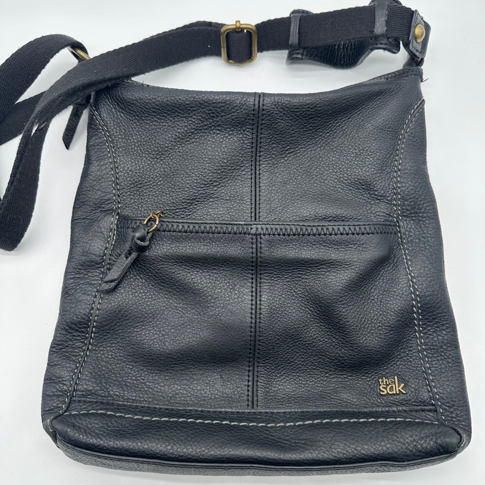 The Sak IRIS Black Pebbled Leather Crossbody Bag Zip Top Front Pocket Brass
